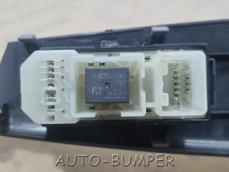Toyota Corolla  Накладка на кнопки стеклоподъемника 7423212410 