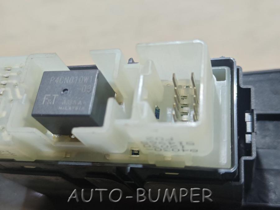 Toyota Corolla  Накладка на кнопки стеклоподъемника 7423212410 