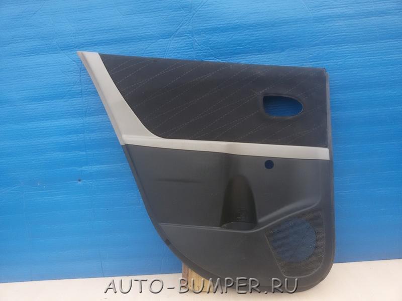 Toyota Yaris Обшивка задней левой двери 67788CD010