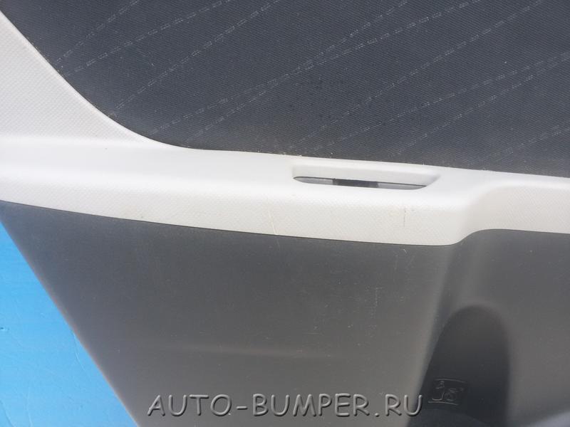 Toyota Yaris Обшивка задней левой двери 67788CD010