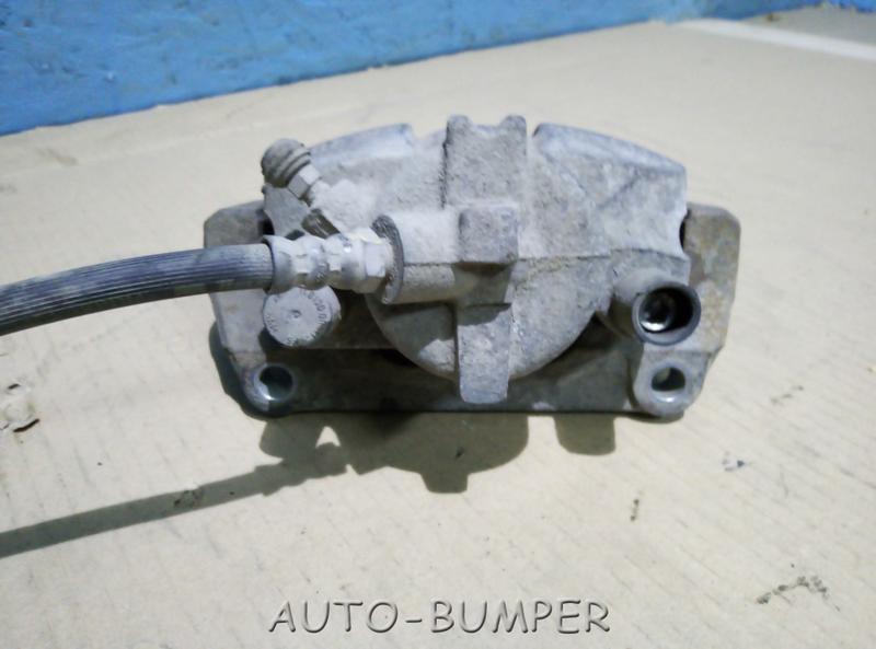 Renault Megane 2 2002- Суппорт тормозной передний левый 7701207685